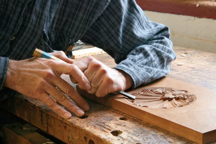 Hands doing woodworking